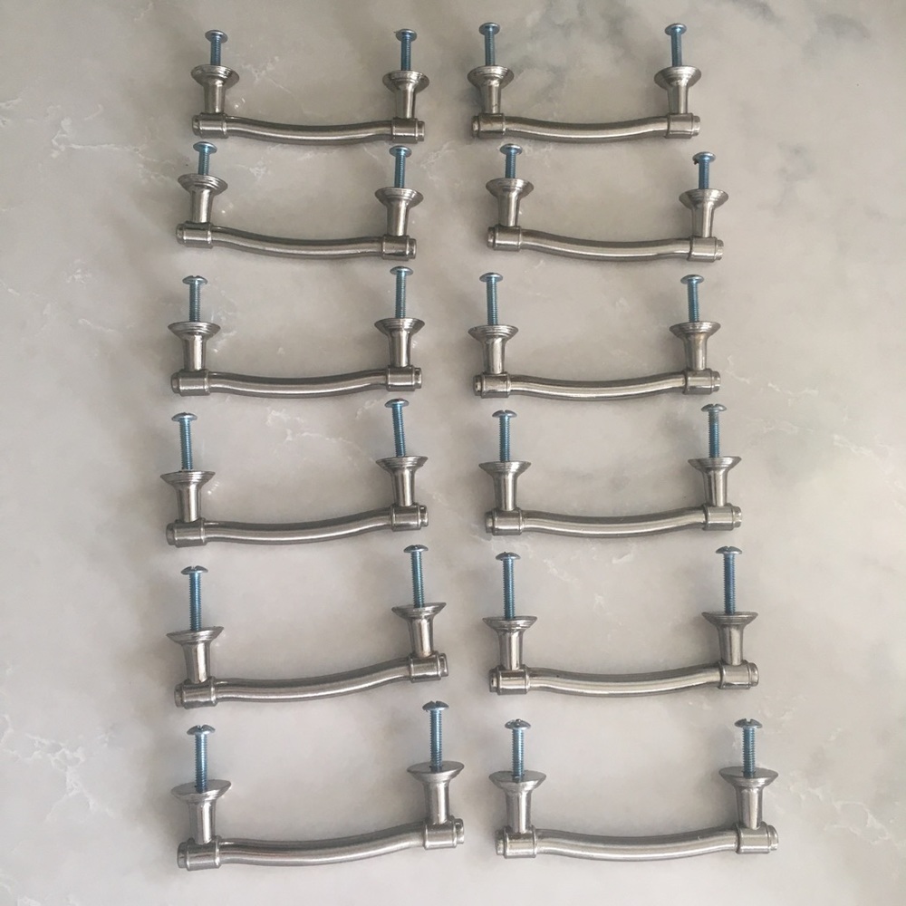 12 brushed nickel 3 1/4 inch door/drawer handles. Great shape, ready to go!